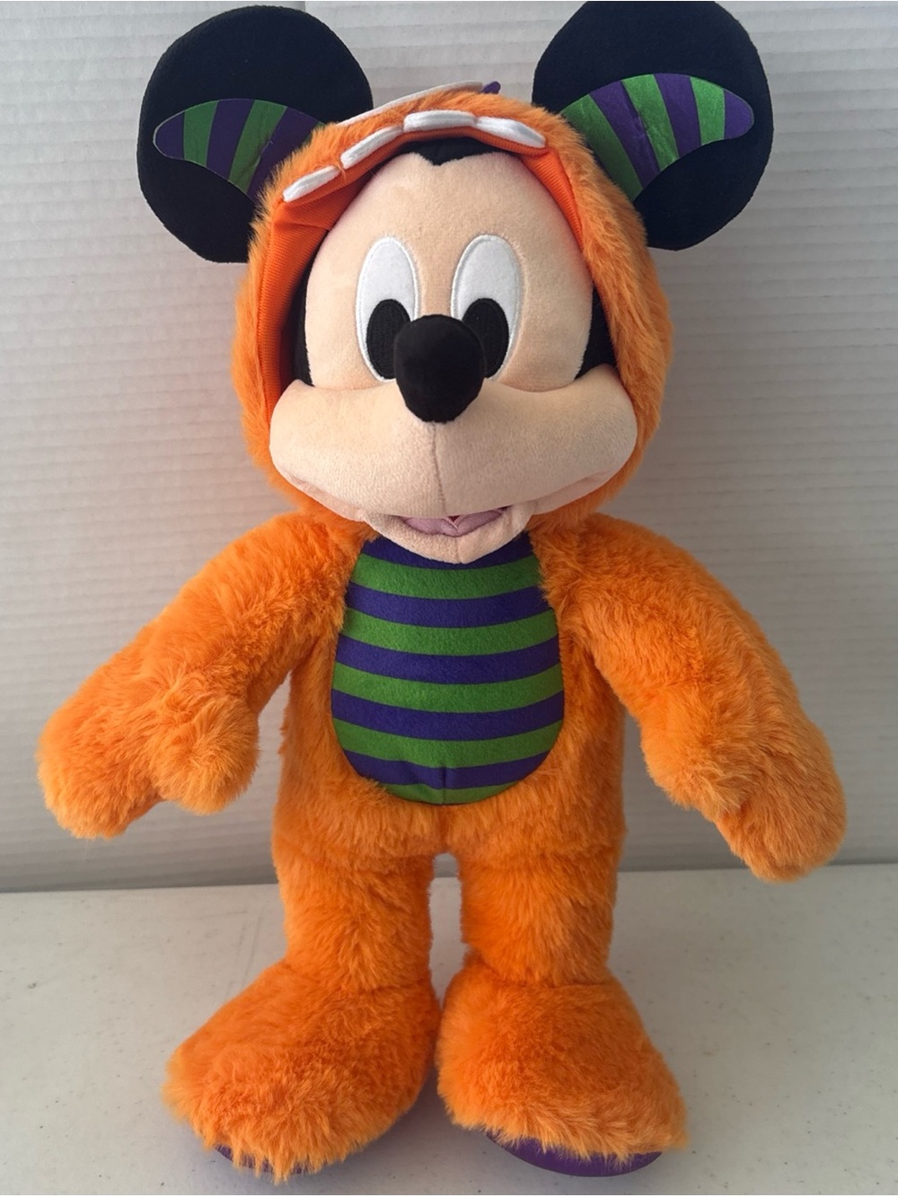 Disney Orange Mickey Mouse Plush with Green & Purple Striped Belly